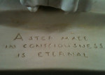 image of writing on the Graduate statue